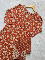 Rust Orange Floral Printed Kurti Neck Work Pant Dupatta Set