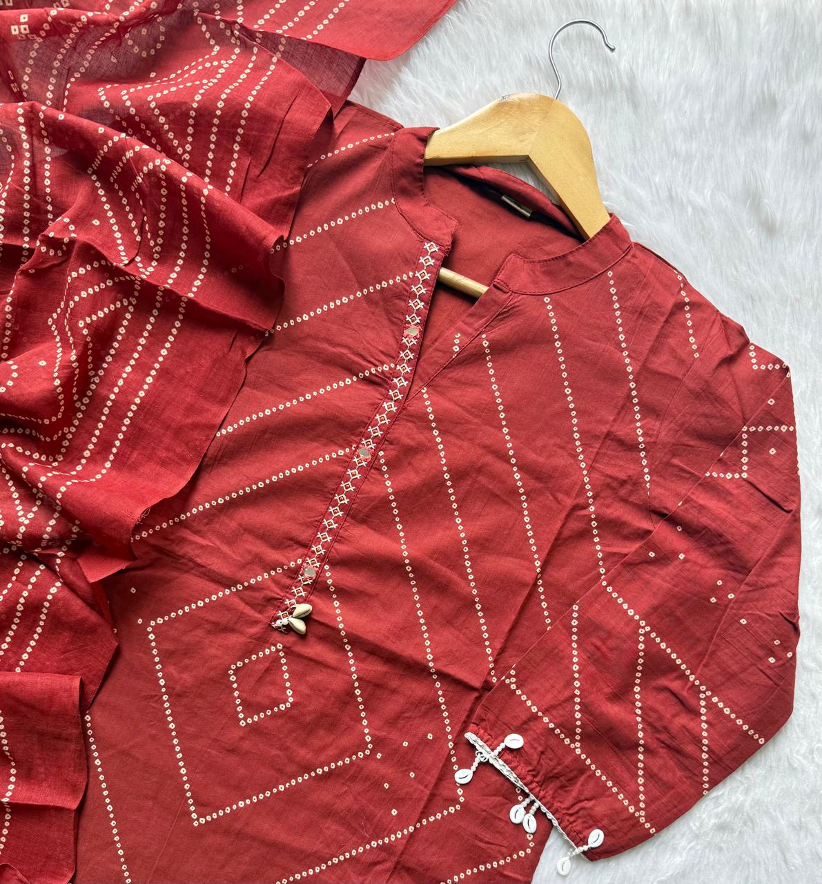 Brick Red Bandhani Print Mul Cotton Kurta Set with Mirror Work Placket, Trousers & Dupatta